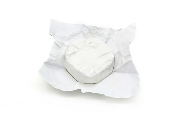 Image showing Soft cheese with white mold Brie in unwrapped packaging