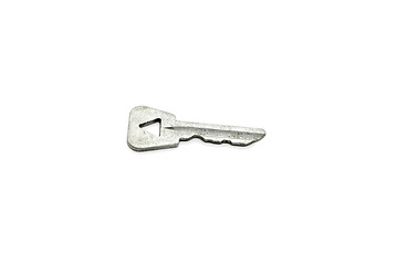 Image showing Old key with a triangular hole on white background