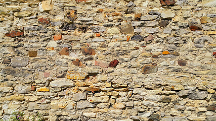 Image showing Ancient wall with stones, cobblestones and bricks