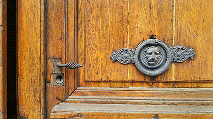 Image showing Vintage door with handle, keyhole and decorative lion head and s