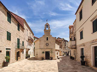 Image showing Small church on square of small urban village of Stari grad on Hvar island in Croatia, Adriatic Sea, Europe.