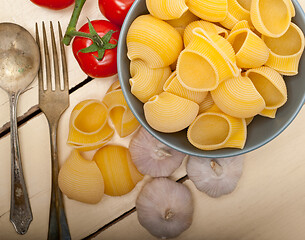 Image showing Italian snail lumaconi pasta with tomatoes