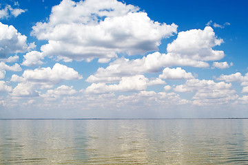 Image showing The blue sky and clouds over a sea bay