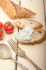 Image showing fresh blue cheese spread ove french baguette