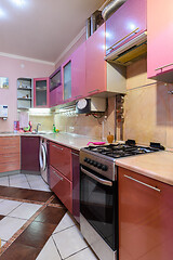 Image showing Kitchen set in an apartment for rent, vertical frame