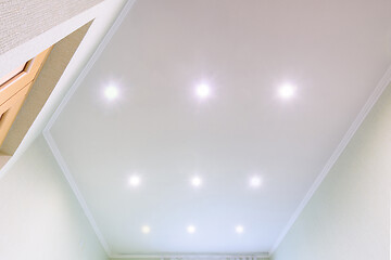 Image showing White beautiful matte stretch ceiling in the interior of the hall