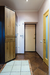 Image showing The interior of the corridor in the apartment, view of the front door