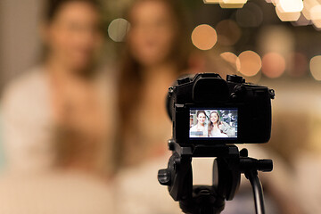 Image showing female bloggers with camera recording home video