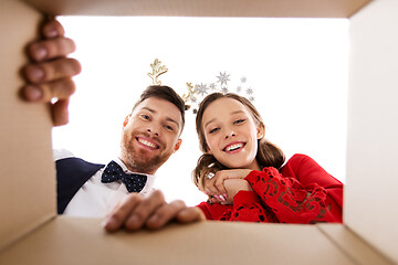 Image showing happy couple opening christmas gift box