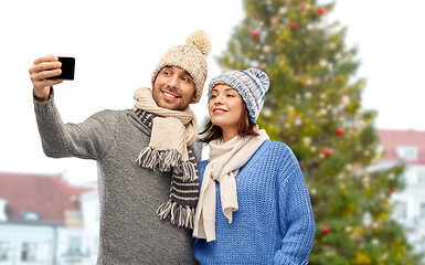 Image showing couple taking selfie at christmas tree in tallinn