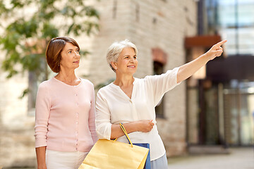 Image showing senior women with shopping bags in tallinn city