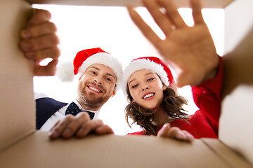 Image showing happy couple opening christmas gift box