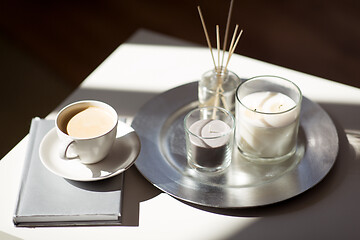 Image showing coffee, candles and aroma reed diffuser on table