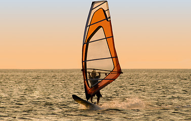 Image showing Silhouette of a windsurfer on the sea