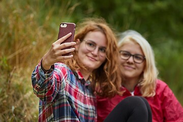 Image showing Girls making faces for selfie