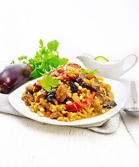 Image showing Rice with vegetables and chicken in plate on white board