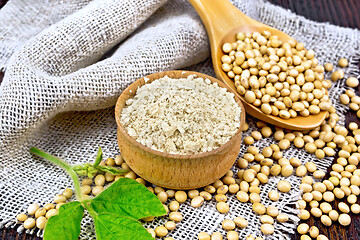 Image showing Flour soy in bowl with spoon on sacking