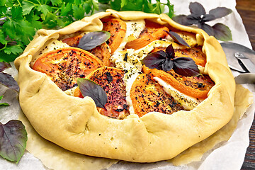 Image showing Galeta with tomato and cheese on wooden board