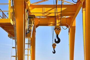 Image showing Crane with hooks hanging