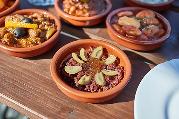 Image showing Tapas served in many small plates