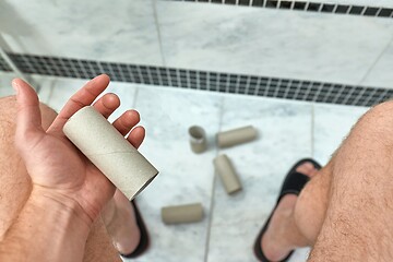 Image showing Finding empty roll in the restroom