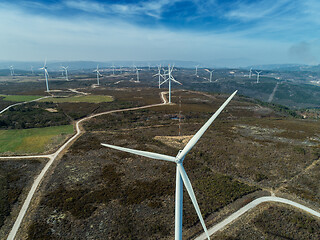 Image showing Windmills or wind turbine on wind farm