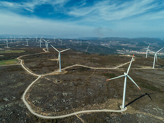 Image showing Windmills or wind turbine on wind farm