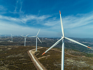 Image showing Windmills or wind turbine on wind farm