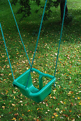 Image showing plastic swing on a rope