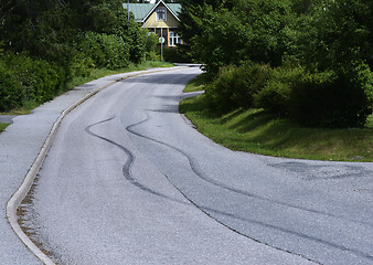 Image showing black marks of braking a car