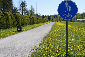 Image showing bicycle and footpath along the hedge in Finland