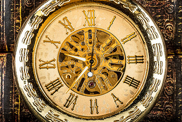 Image showing Antique clock dial close-up. Vintage pocket watch.