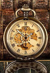 Image showing Antique clock dial close-up. Vintage pocket watch.