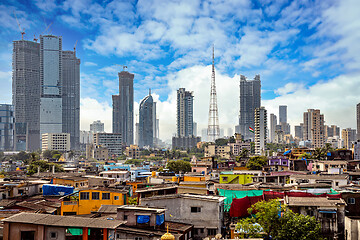 Image showing Views of slums on the shores of mumbai, India against the backdr