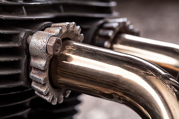 Image showing Custom bobber motorbike in an workshop garage.