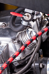 Image showing Custom bobber motorbike in an workshop garage.