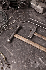 Image showing Old tools set on a vintage metallic background with space for text
