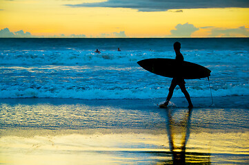 Image showing Surfer at sunset, Bali island