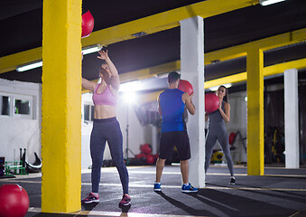 Image showing young athletes working out with medical ball