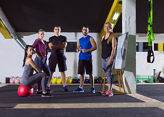 Image showing athletes getting instructions from trainer