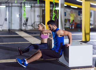 Image showing athletes working out their arms