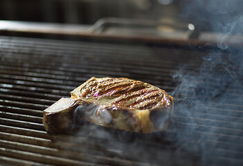 Image showing steak on the grill