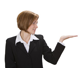 Image showing Businesswoman presenting something