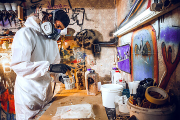 Image showing Master painter in a factory