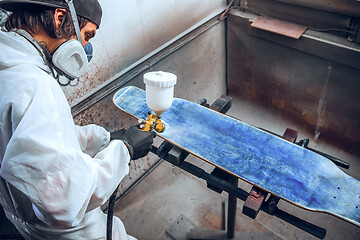 Image showing Master painter in a factory