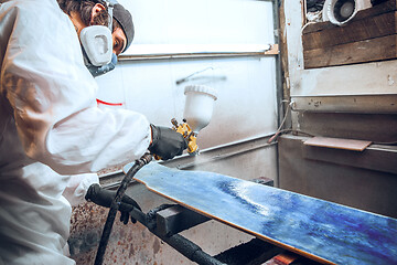 Image showing Master painter in a factory