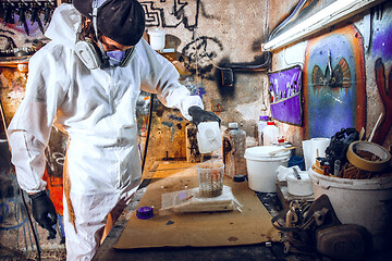 Image showing Master painter in a factory