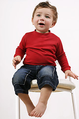 Image showing Toddler on a  Stool