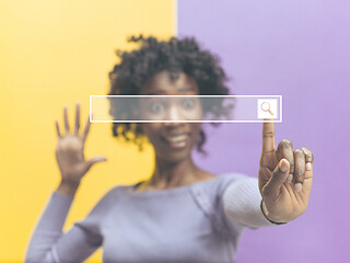 Image showing Woman\'s hand with finger on blue background