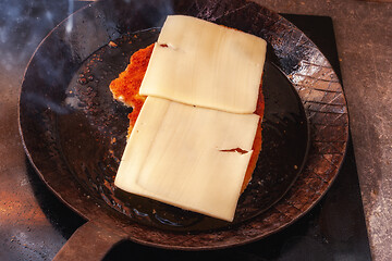 Image showing Cheese escalope in a pan